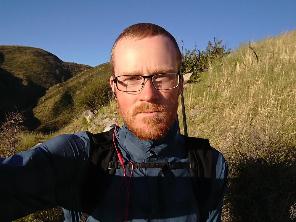 Early morning selfie before the sun for powerful enough to cause me to lose my rain jacket