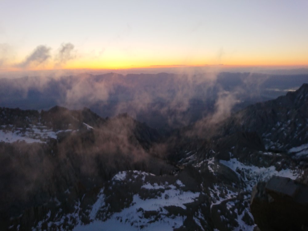 Early glimpse of the sunrise at the summit