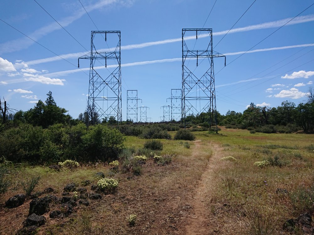 The side trail to the ranch followed the power lines